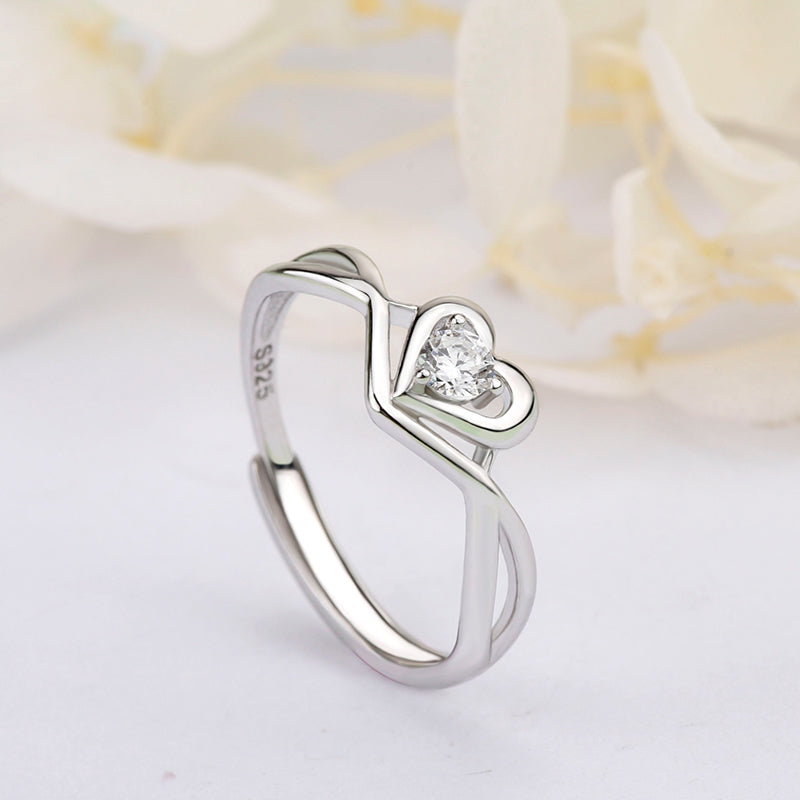 S925 Sterling Silver Love Heart Adjustable This stunning sterling silver ring showcases a highly polished, smooth surface, embellished with a brilRing