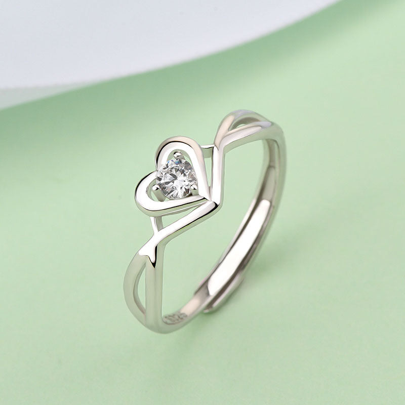 S925 Sterling Silver Love Heart Adjustable This stunning sterling silver ring showcases a highly polished, smooth surface, embellished with a brilRing