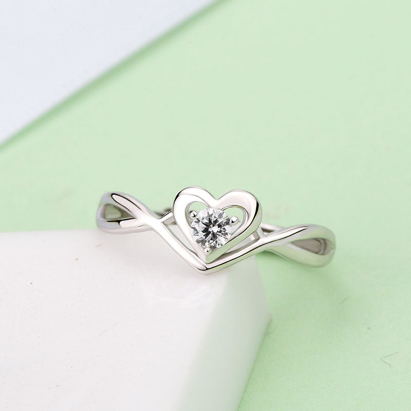 S925 Sterling Silver Love Heart Adjustable This stunning sterling silver ring showcases a highly polished, smooth surface, embellished with a brilRing