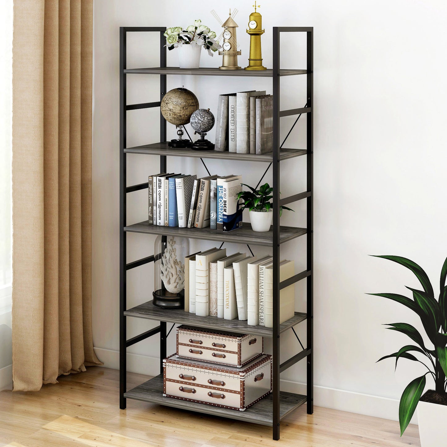 Tall wood and metal bookshelf with books and decorative items 
