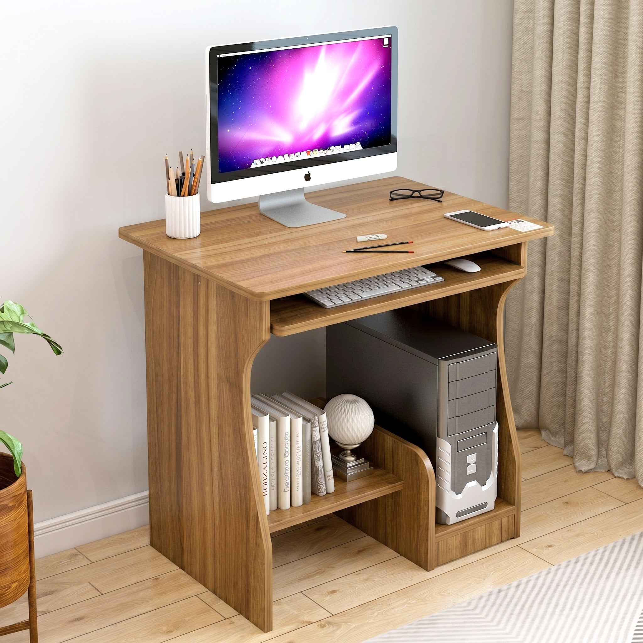 Wooden computer desk with a monitor, keyboard, and other items in a room setting.